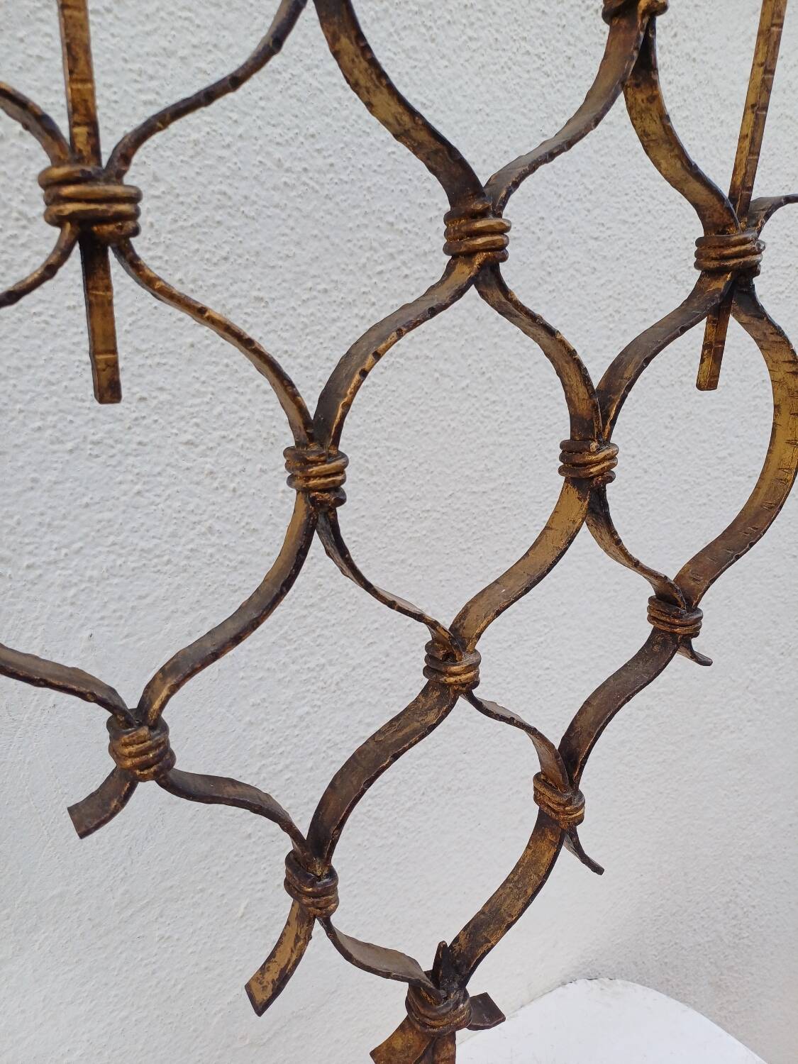 Large hammered wrought iron table candlesticks, gilded, 1950s, 60s