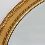 Oval shaped carved gilded Baroque mirror with beveled glass, Belgium