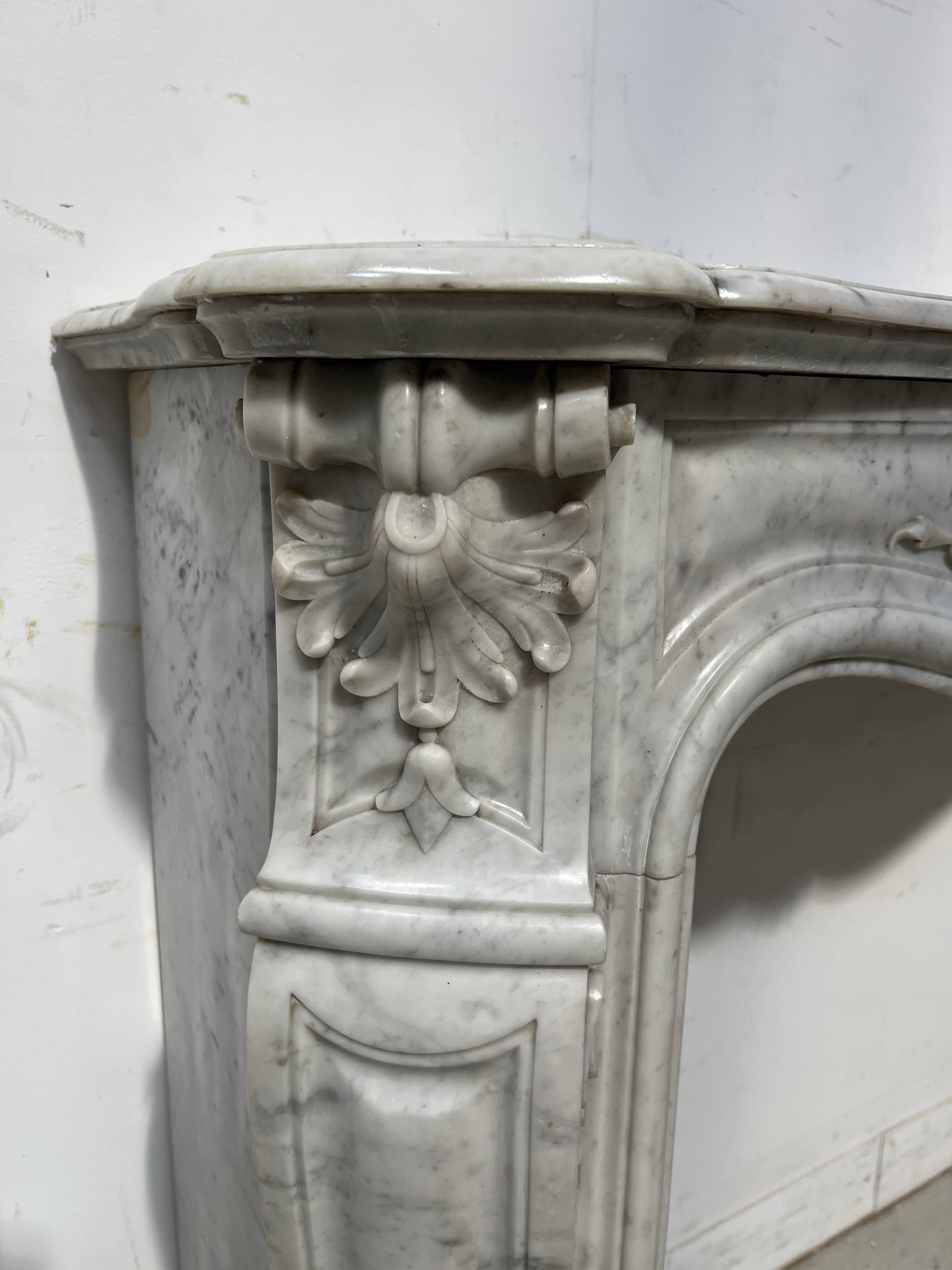 Louis XV style white Carrara marble fireplace, 19th century.