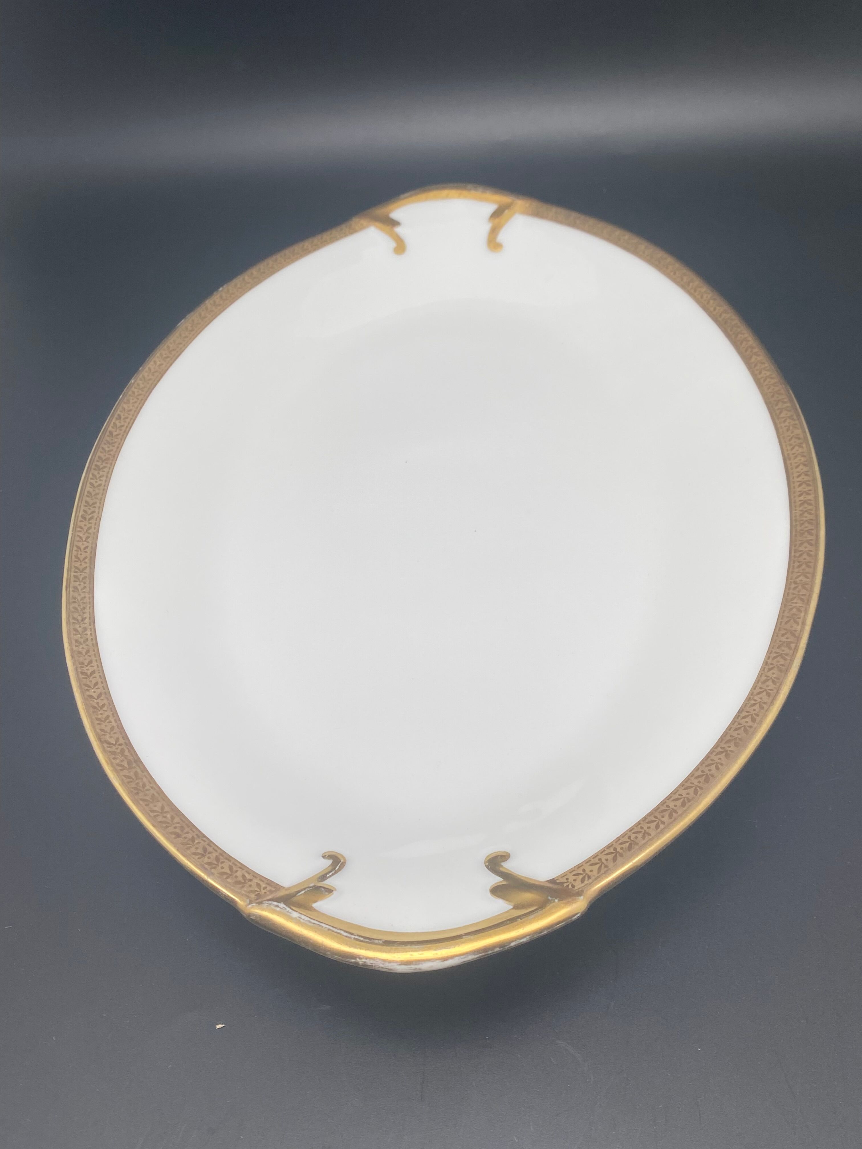 Oval flat Limoges golden tower