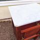 Set of 2 wooden and marble bedside tables.