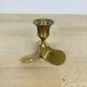 Golden brass propeller candle holder