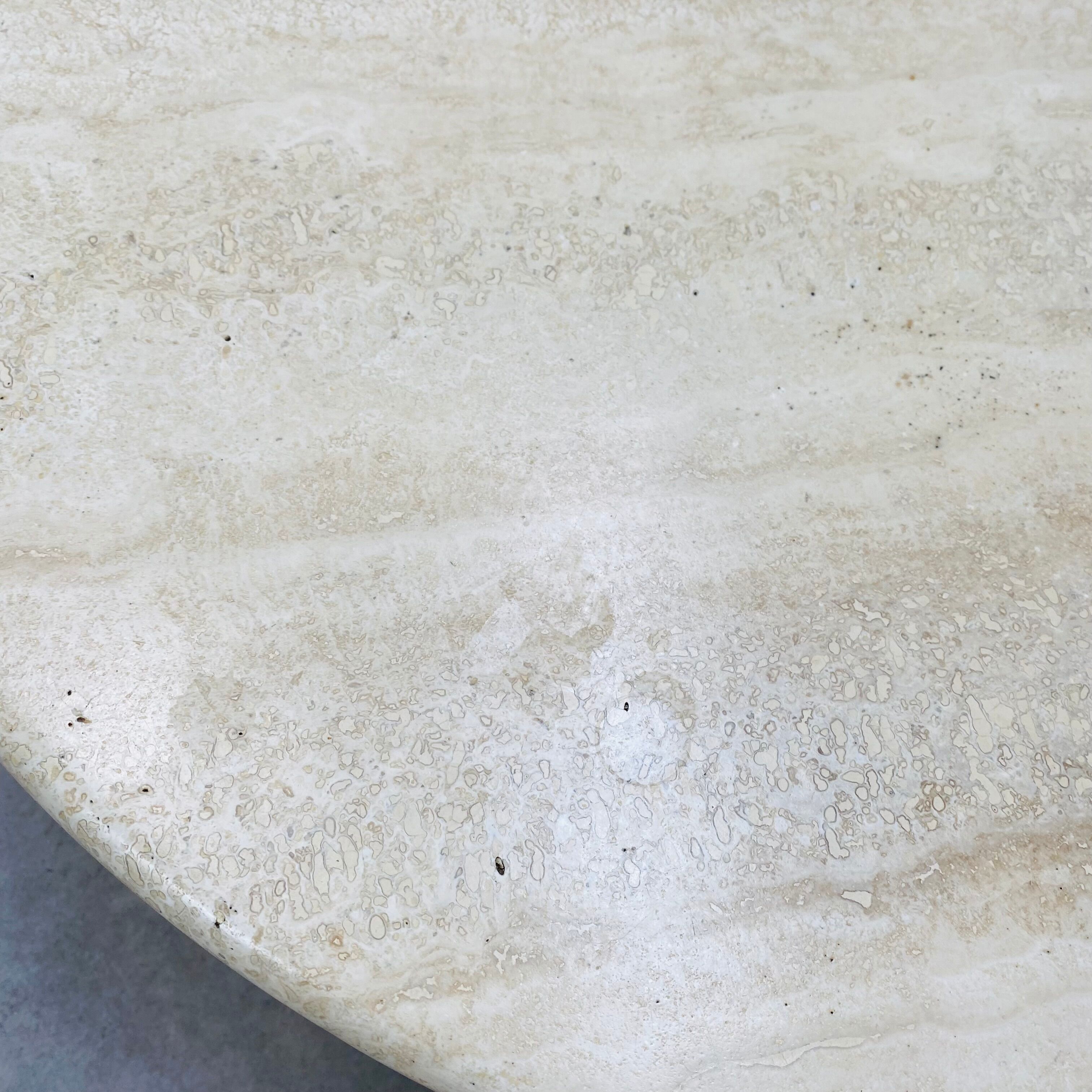 Travertine eye coffee table Roche Bobois