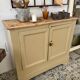 Beige two-door sideboard