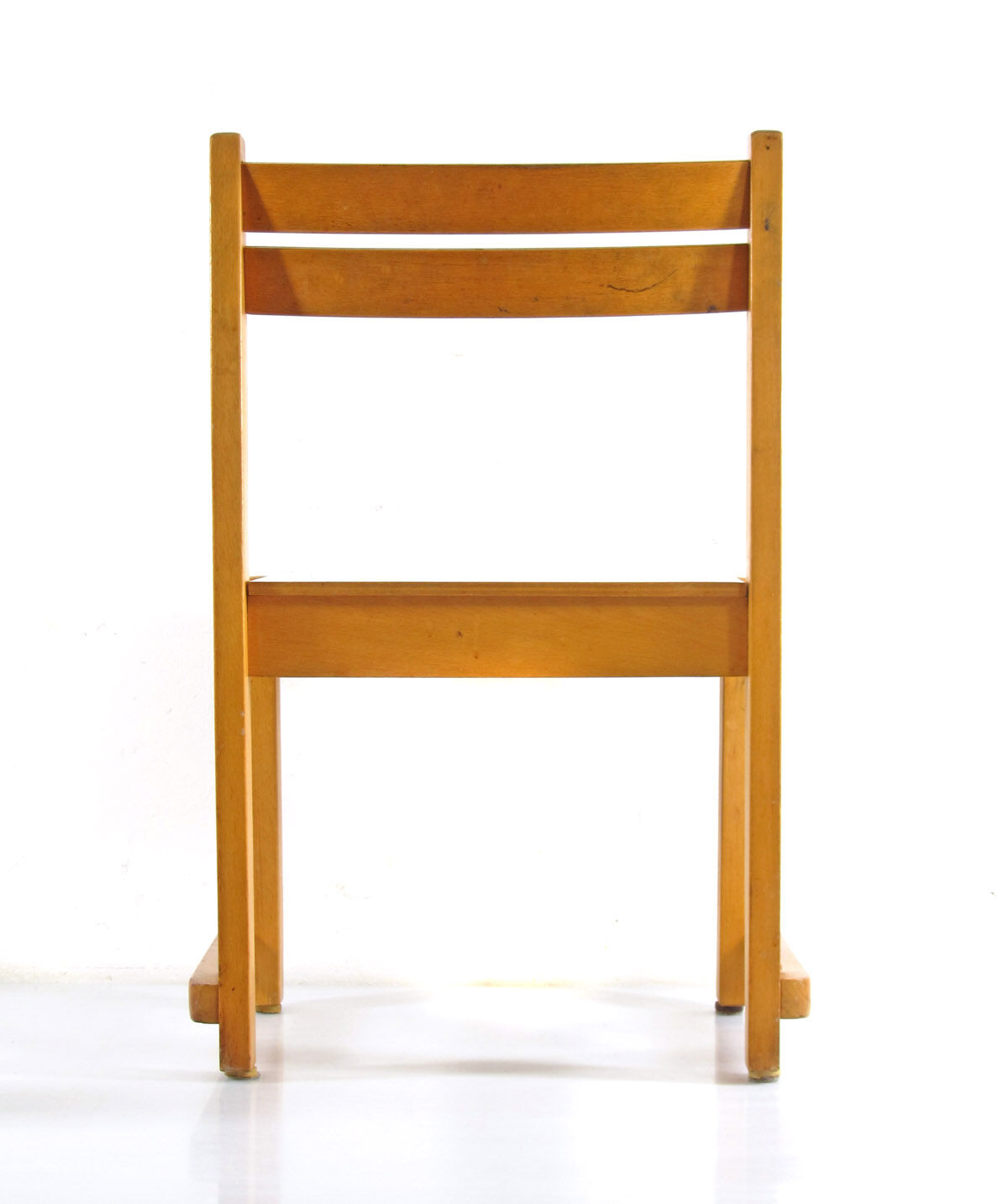 Children's chair in plywood in Scandinavian Danish style.