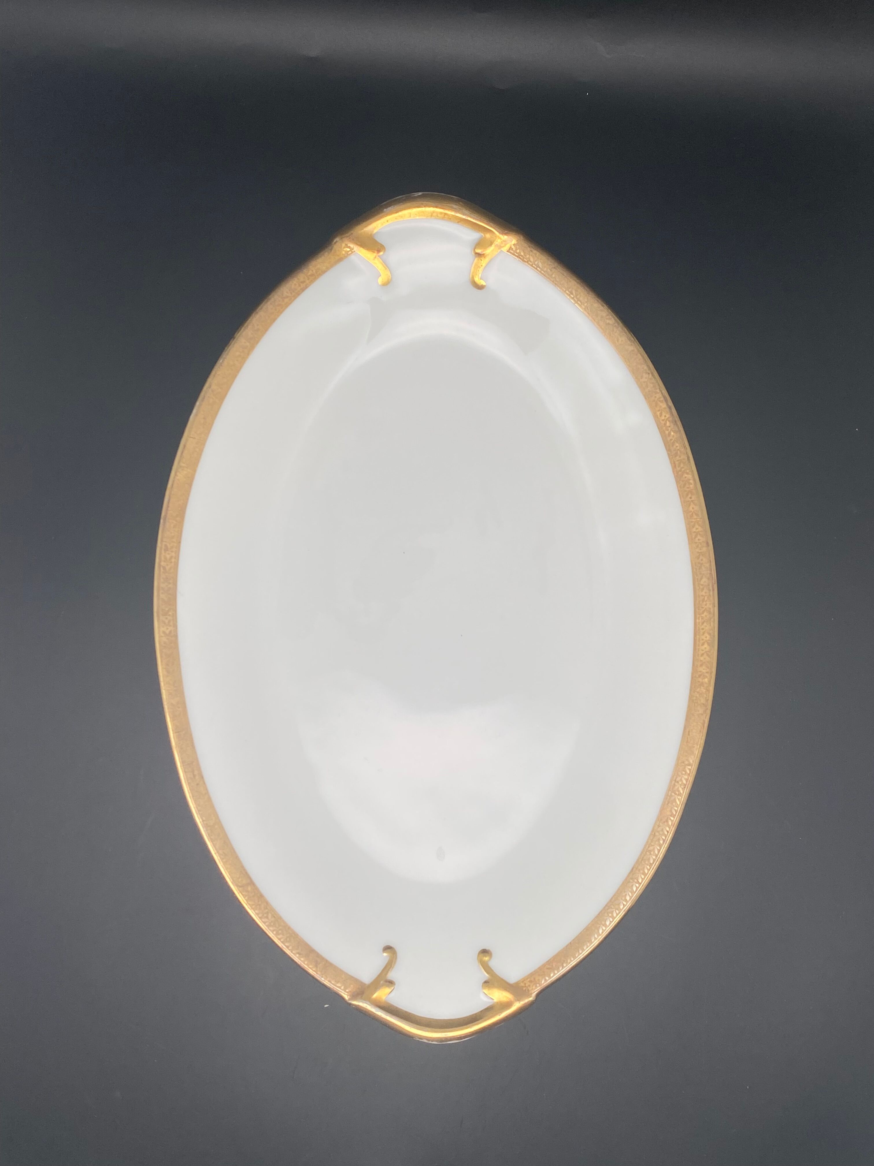 Oval flat Limoges golden tower