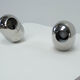 Ensemble de deux lampes de table Reggiani en chrome.