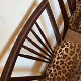 Pair of vintage wood and leopard chairs