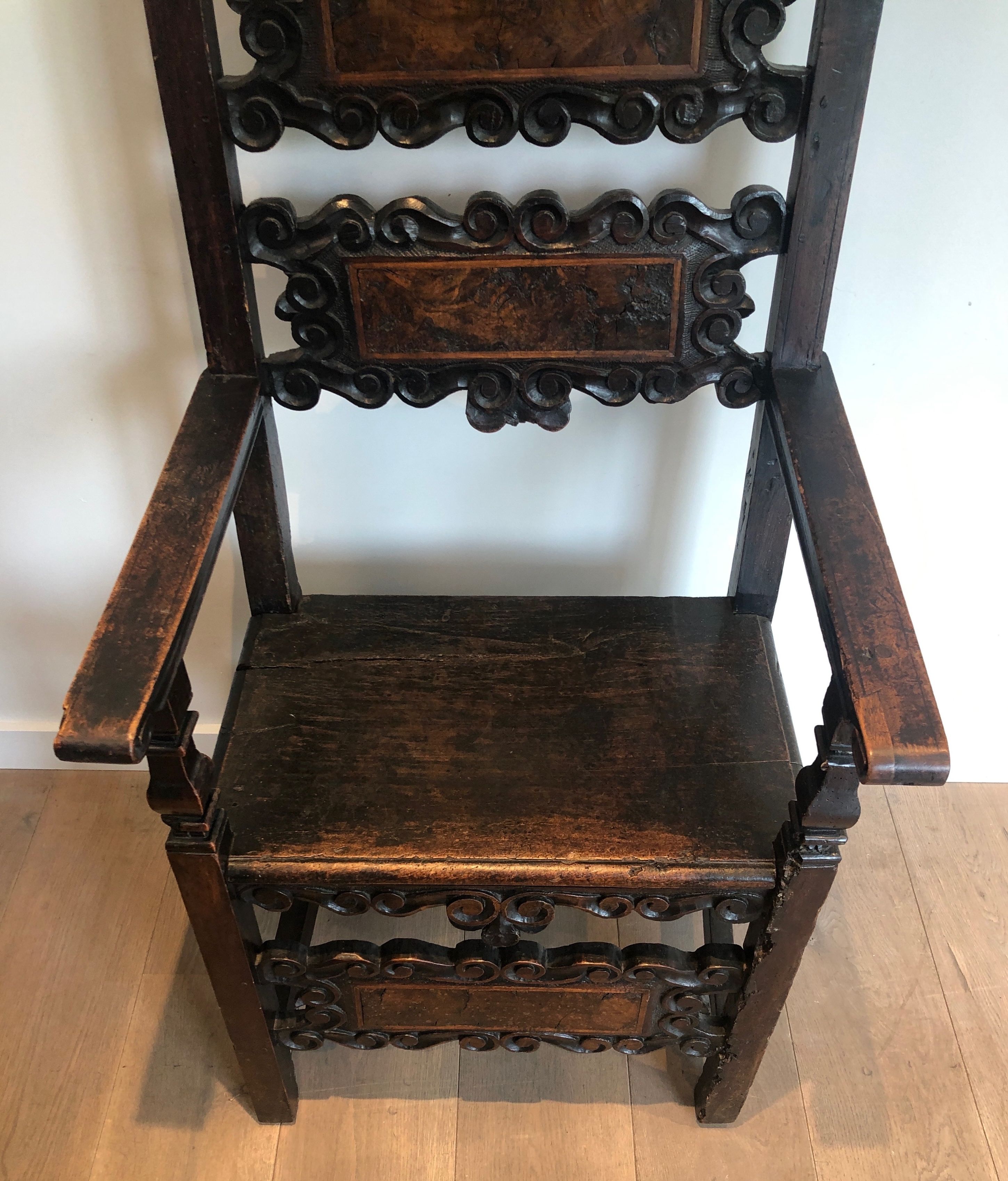 Set of an armchair and a pair of chairs in Italian Renaissance walnut