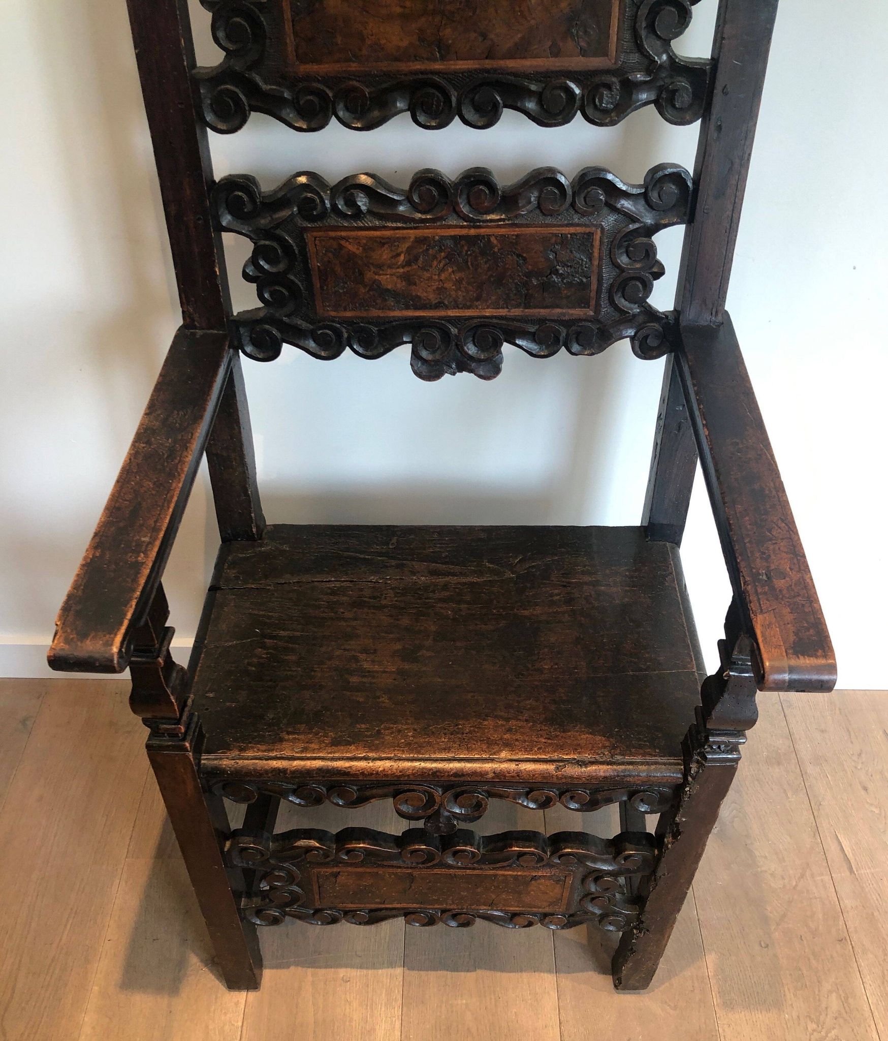 Set of an armchair and a pair of chairs in Italian Renaissance walnut