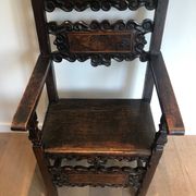 Set of an armchair and a pair of chairs in Italian Renaissance walnut
