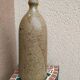 Sandstone bottle with inlaid fern décor by Alain Bernard Breton potter