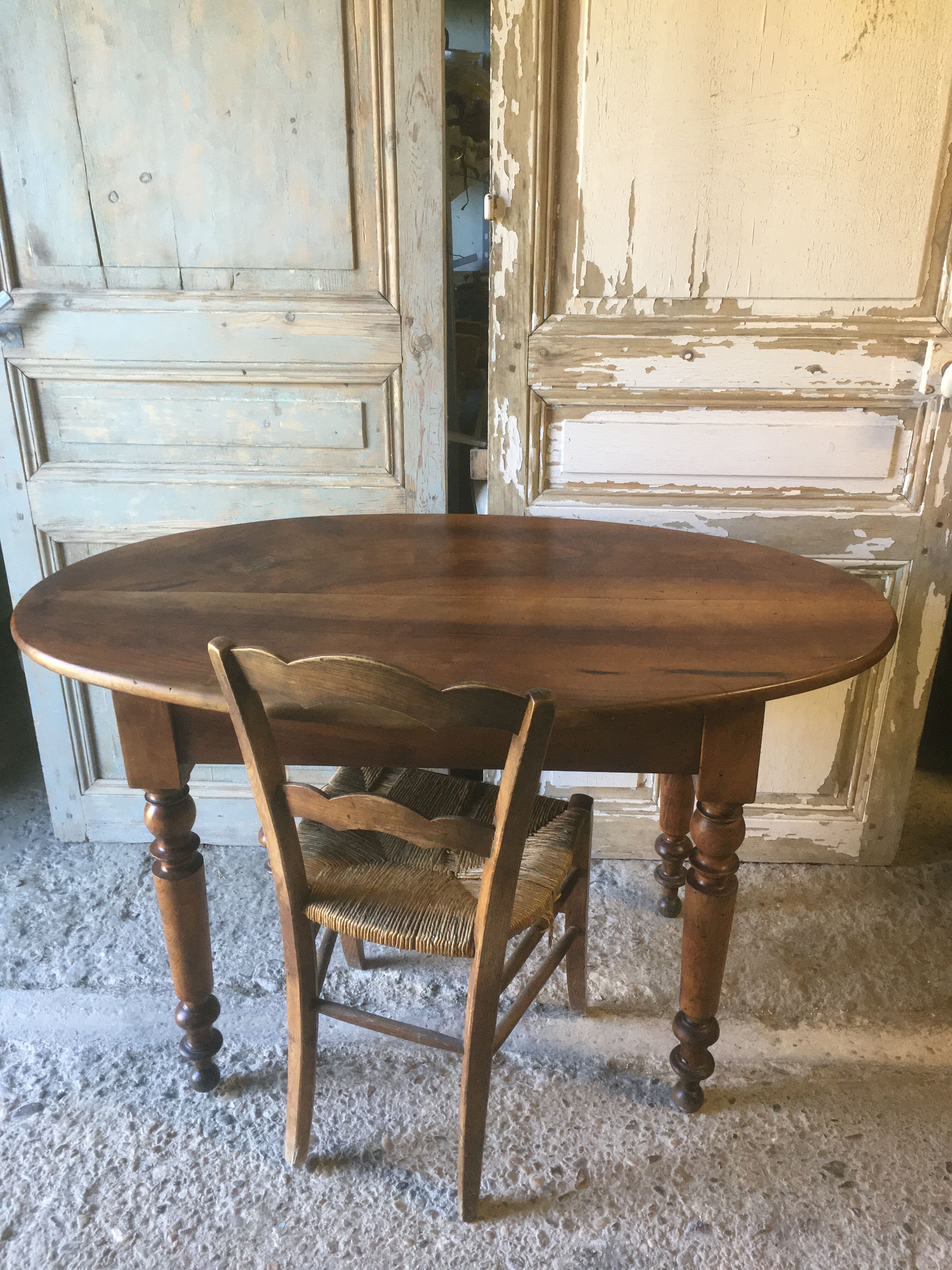 Oval walnut table