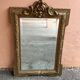 Napoleon-style mirror with a pediment