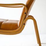 Vintage armchairs with cushions