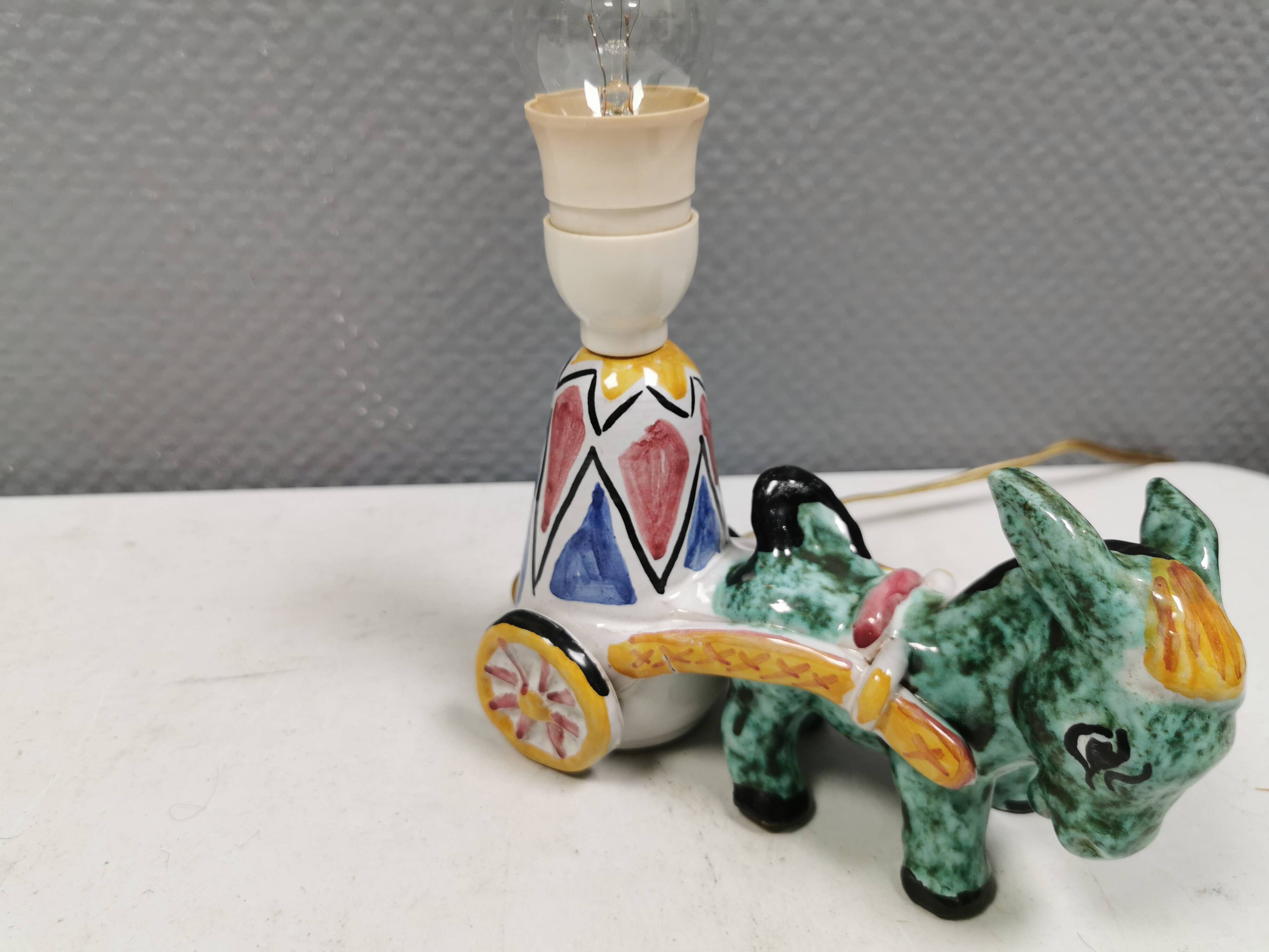 Unique "donkey" table lamp in ceramic with a harlequin pattern, Italy 1970s