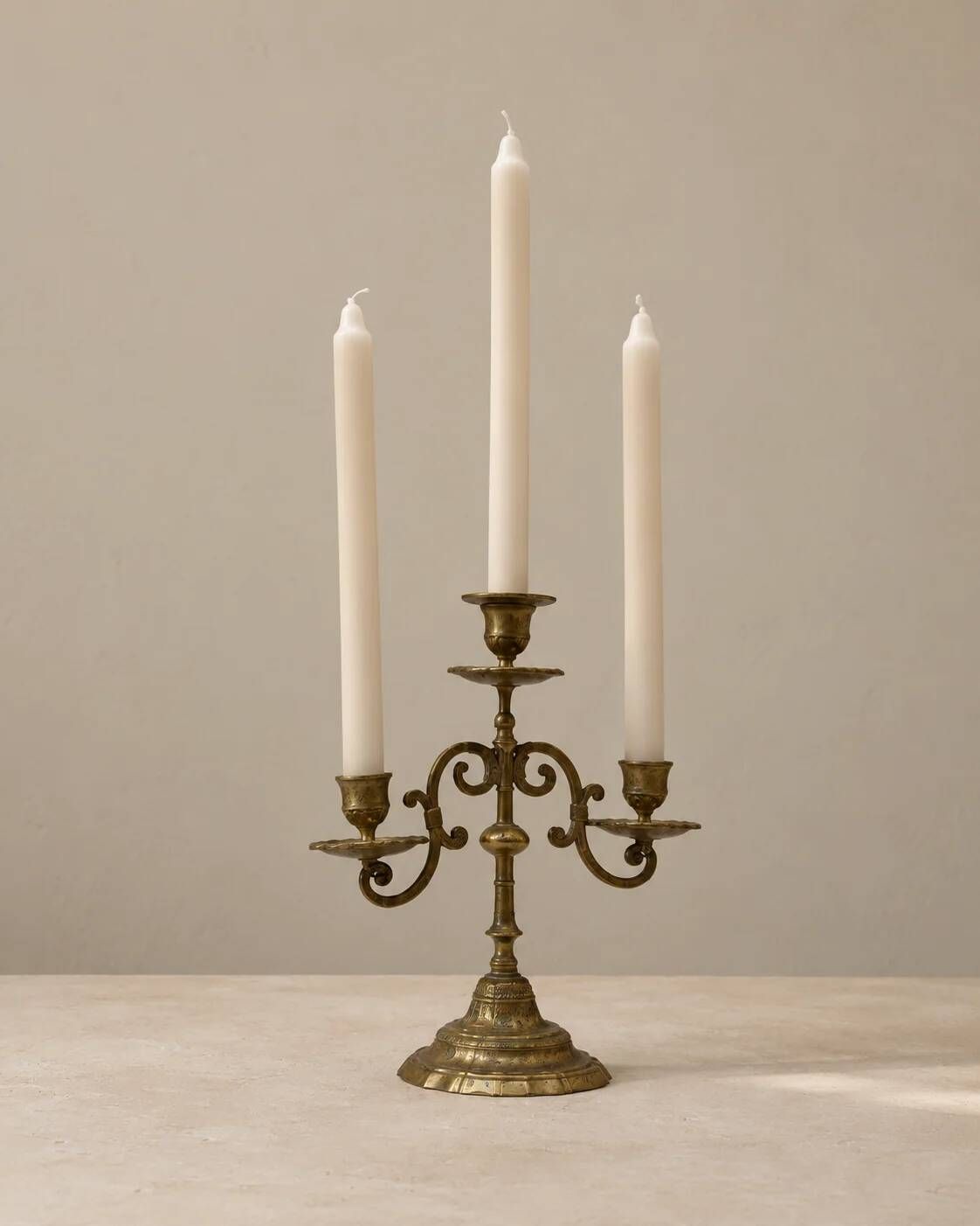 Three-light candelabrum in engraved brass — France, circa 1900