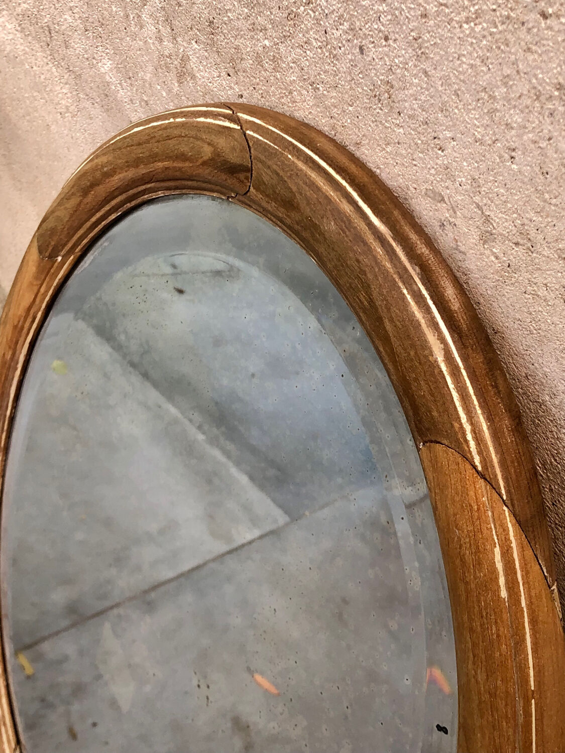Oval wooden mirror