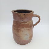 Pitcher in folk art sandstone