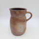 Pitcher in folk art sandstone
