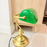Gold and green banker’s desk lamp.