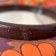 Miroir rond plastique chocolat vintage 1970