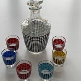 Liquor service consisting of a carafe and 6 small shot glasses, vintage houndstooth pattern