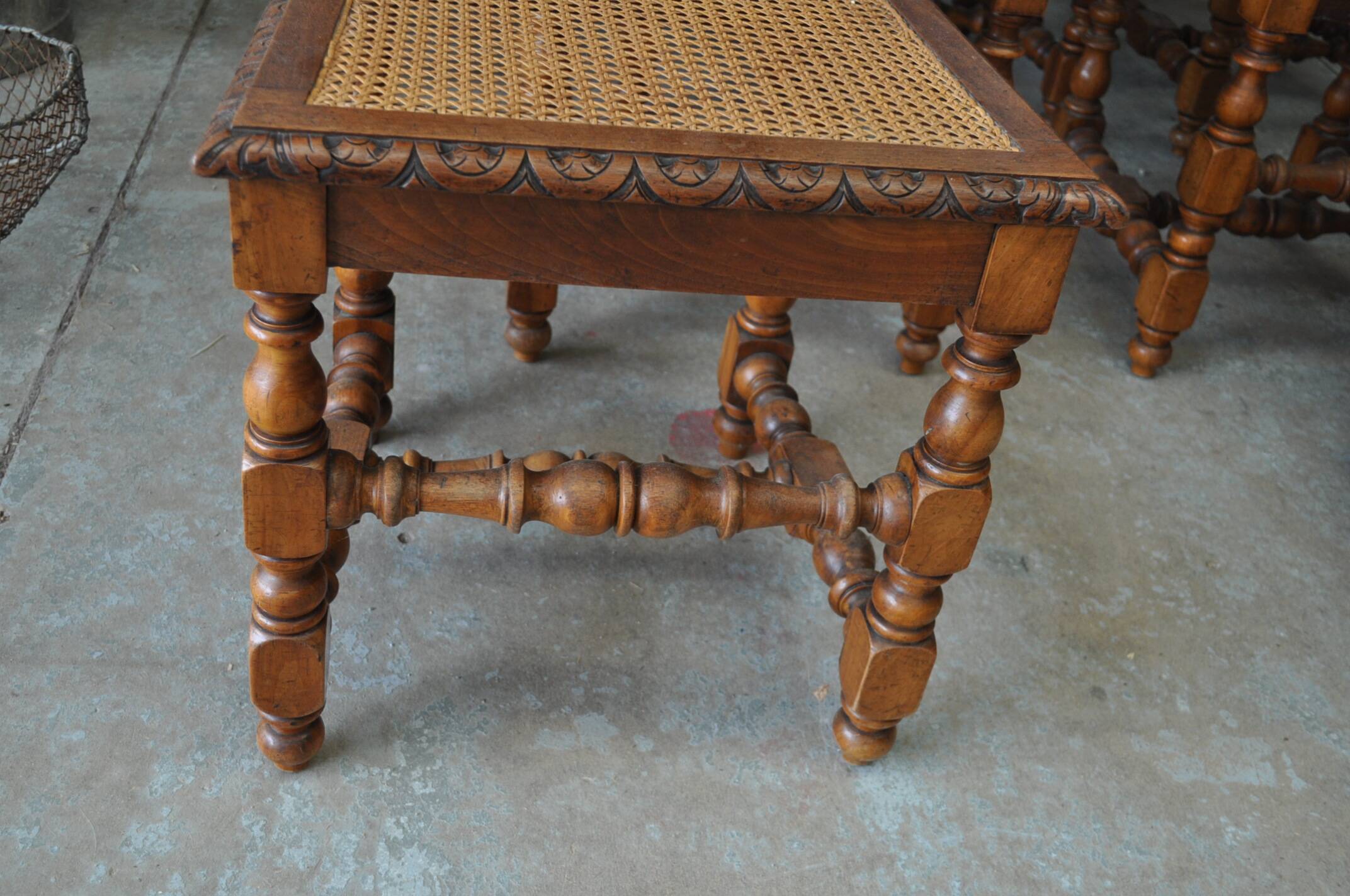 Set of 8 tanned chairs.