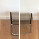Pair of sofa ends in chrome, blackened wood and glass