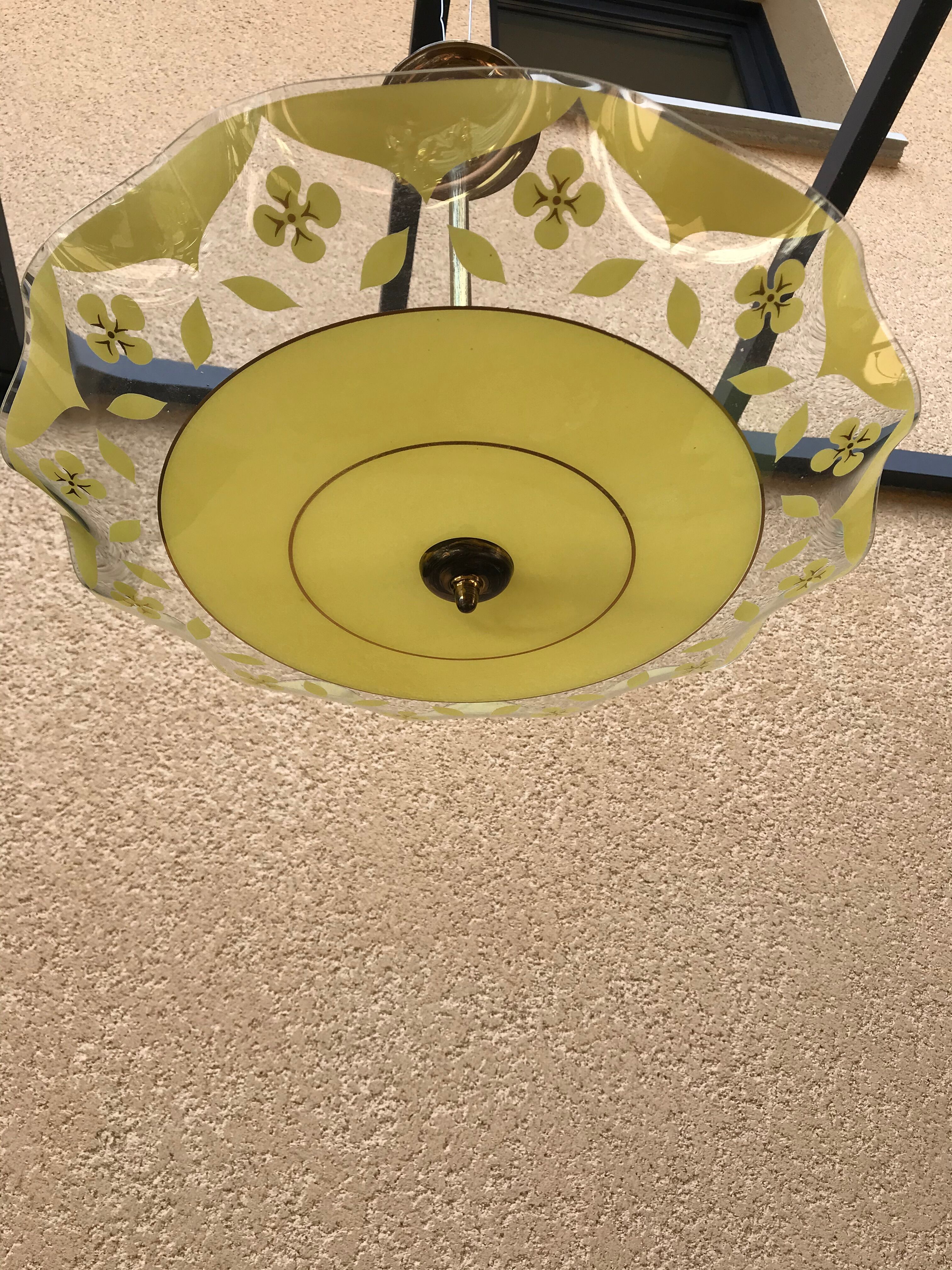 Brass and yellow glass hanging lamp