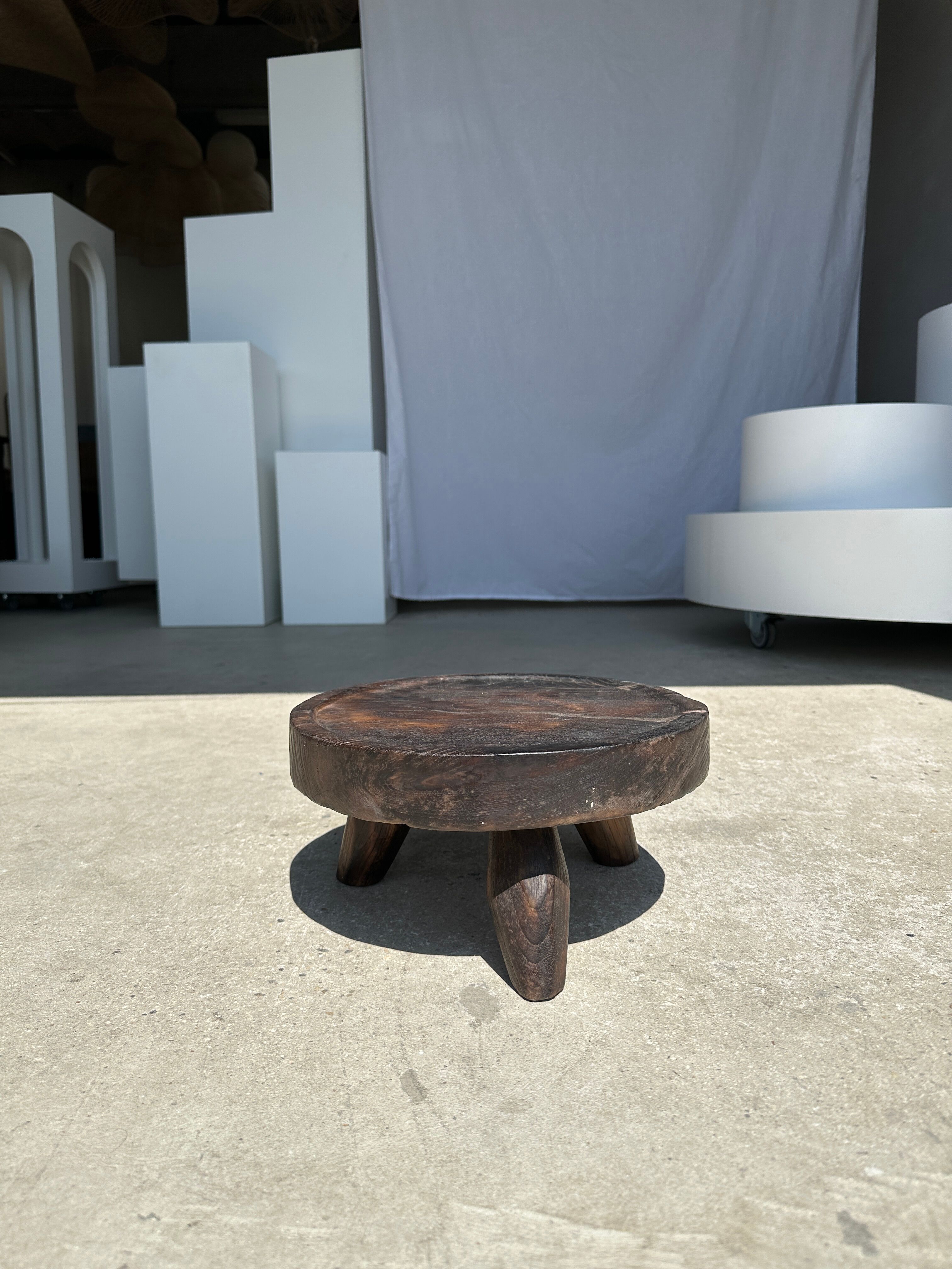 Small tripod stool low in dark brown upcycled teak
