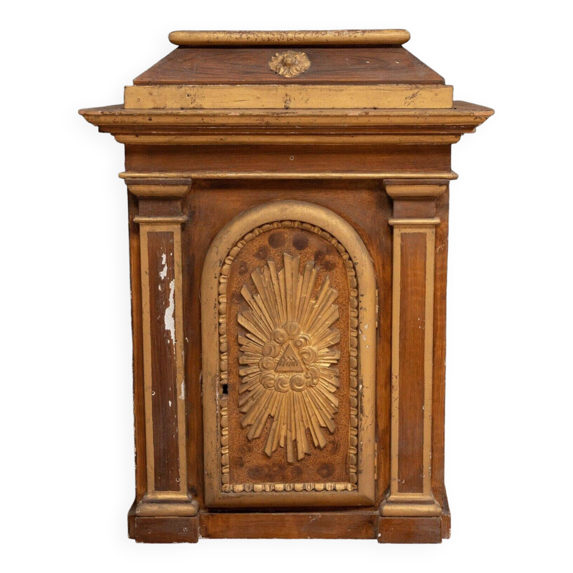 18th century tabernacle decorated with 2 columns and a sun on the facade