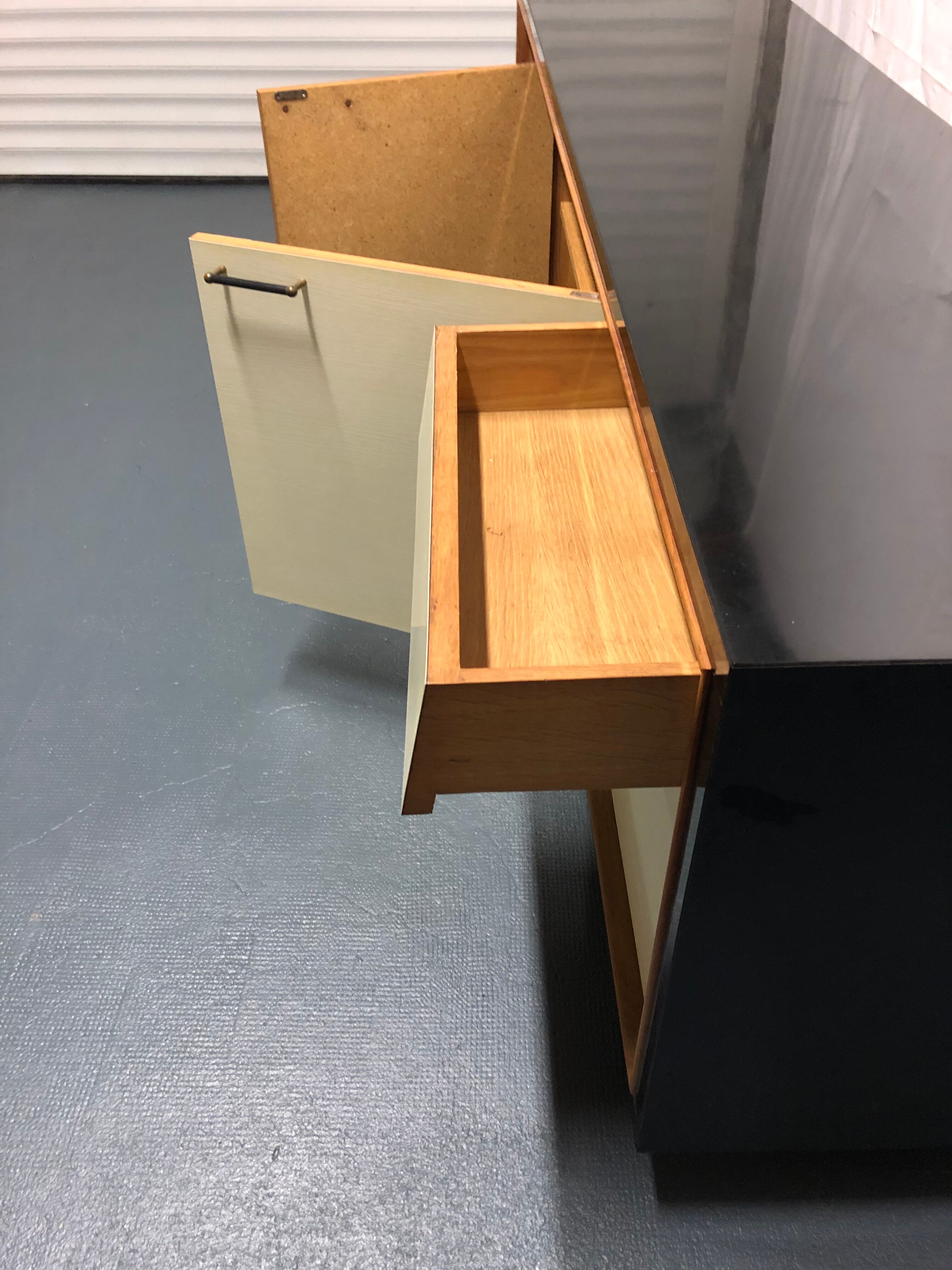 Sideboard in wood and black laque, circa 1960s