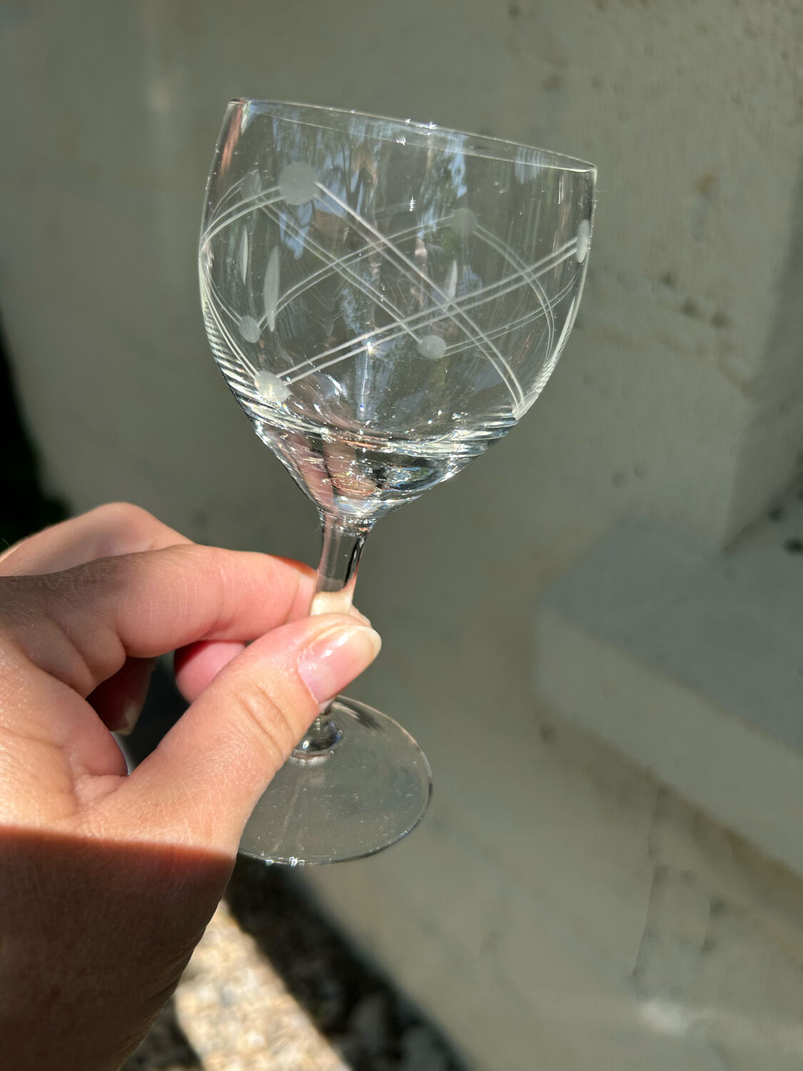 Series of 10 engraved crystal wine glasses