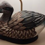 Decorative table lamp with a sculpted duck-shaped base and painted finish.