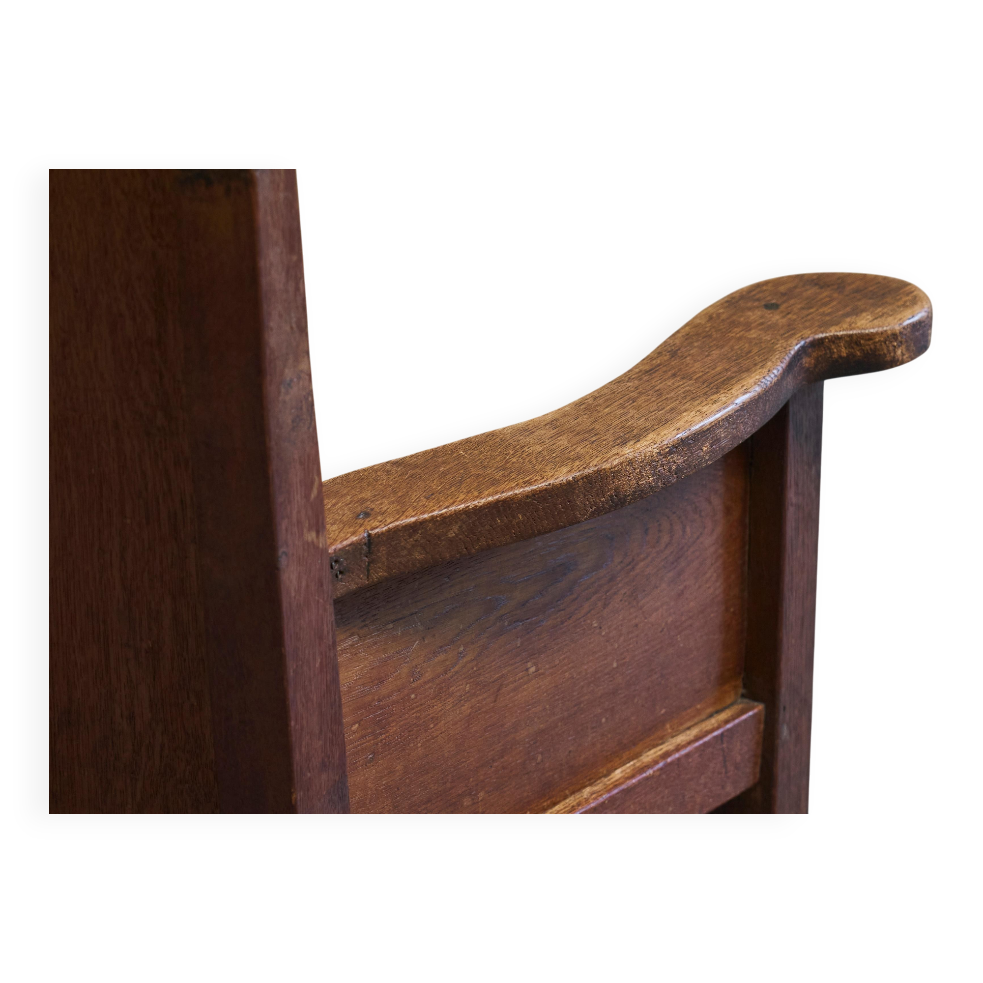 Antique solid oak armchair, 19th-century farmer style.