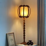 Turned wood lamp.