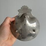 Silver metal shell emptier