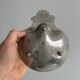 Silver metal shell emptier