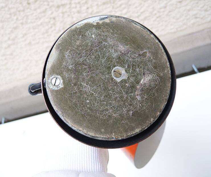 Old orange enameled sheet metal lamp