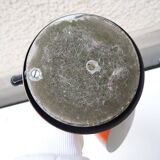 Old orange enameled sheet metal lamp