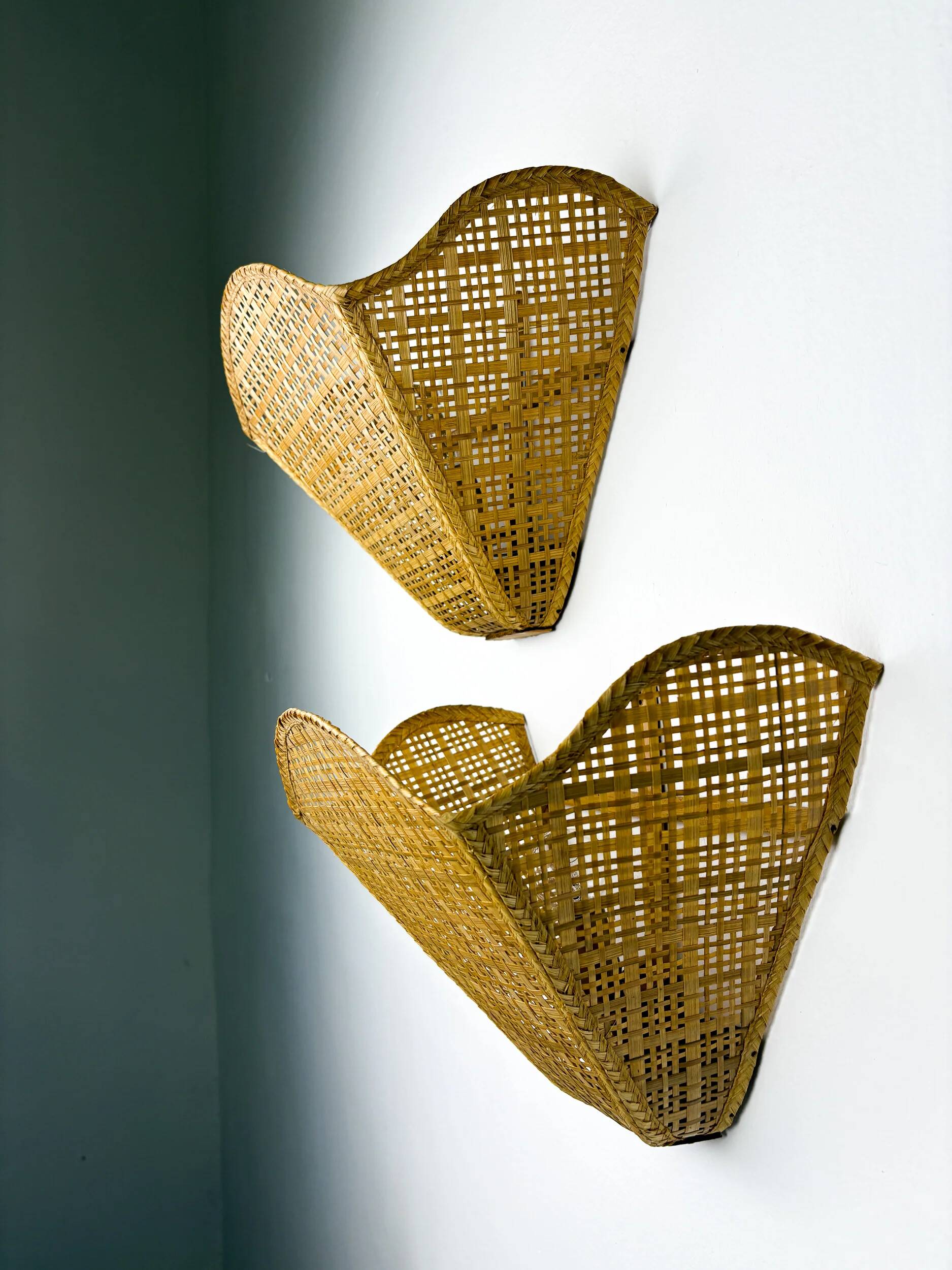 Pair of scalloped rattan wall sconces, sourced in Spain, 1980s