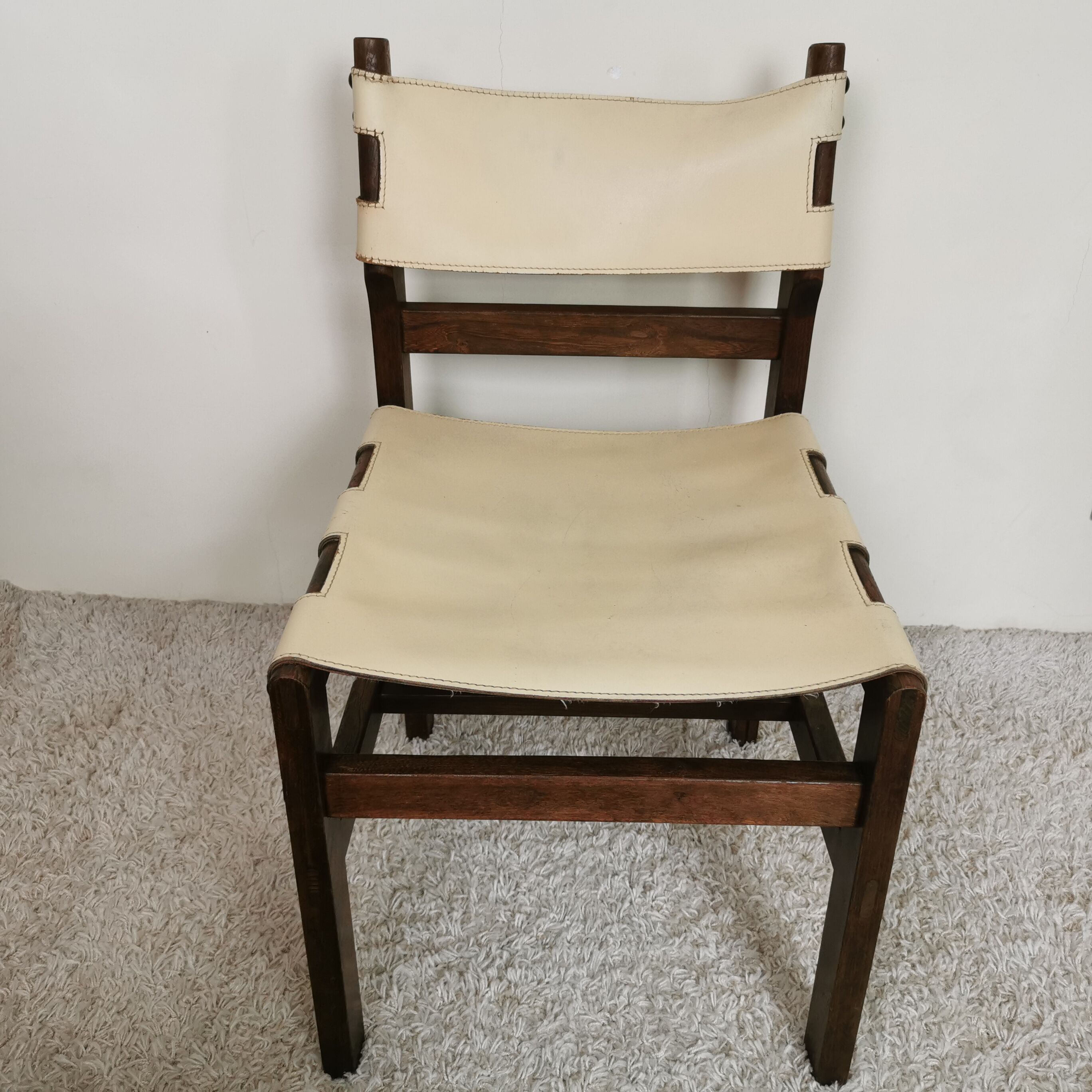 Series of 4 wooden and leather chairs