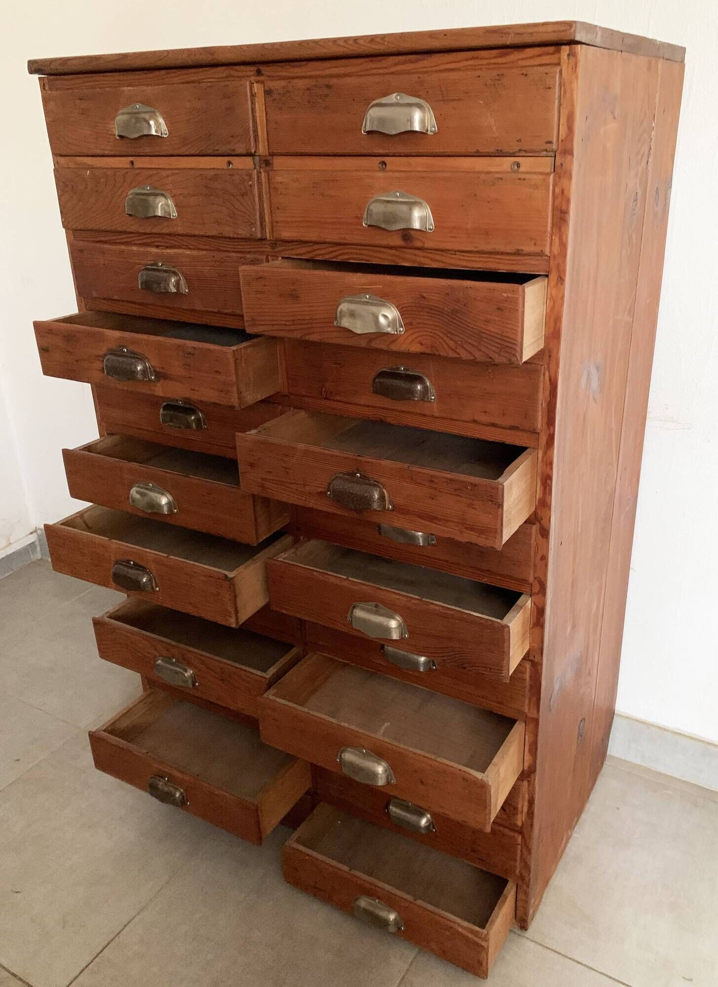 Old apothecary trade furniture in vintage wood 24 drawers.