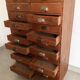 Old apothecary trade furniture in vintage wood 24 drawers.
