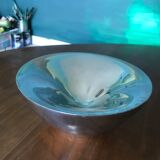 Empty chrome pocket bowl
