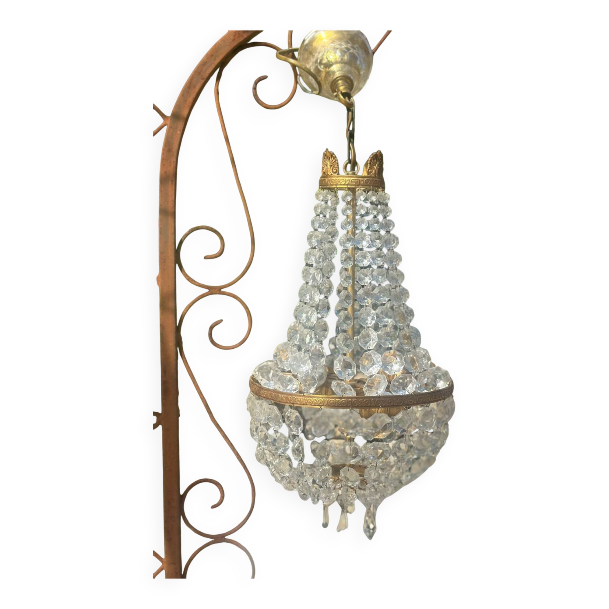 Basket chandelier with crystal and gilded brass pendants, circa 1930.