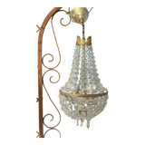 Basket chandelier with crystal and gilded brass pendants, circa 1930.