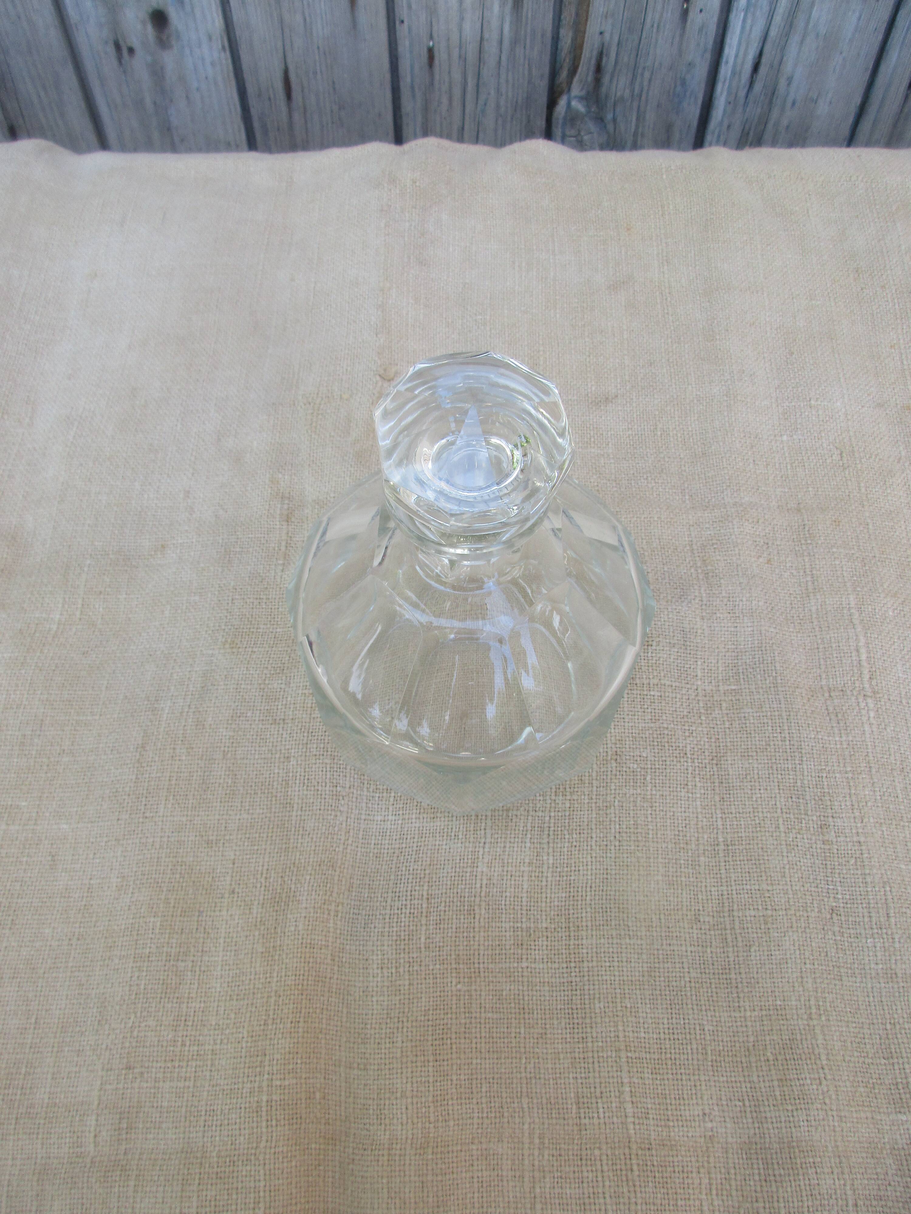 Glass decanter and diamond tip emeri cap