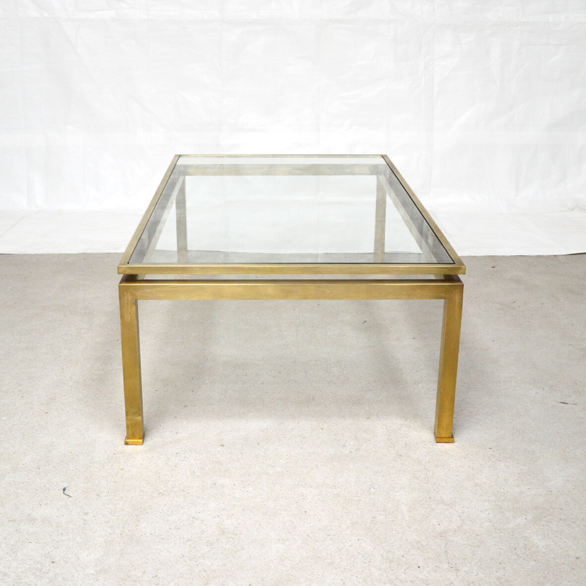 Brass coffee table by Guy Lefèvre